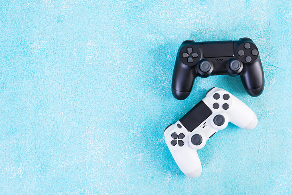 gaming-controllers-on-a-textured-blue-background-2026-03-17-03-19-32-utc (1)