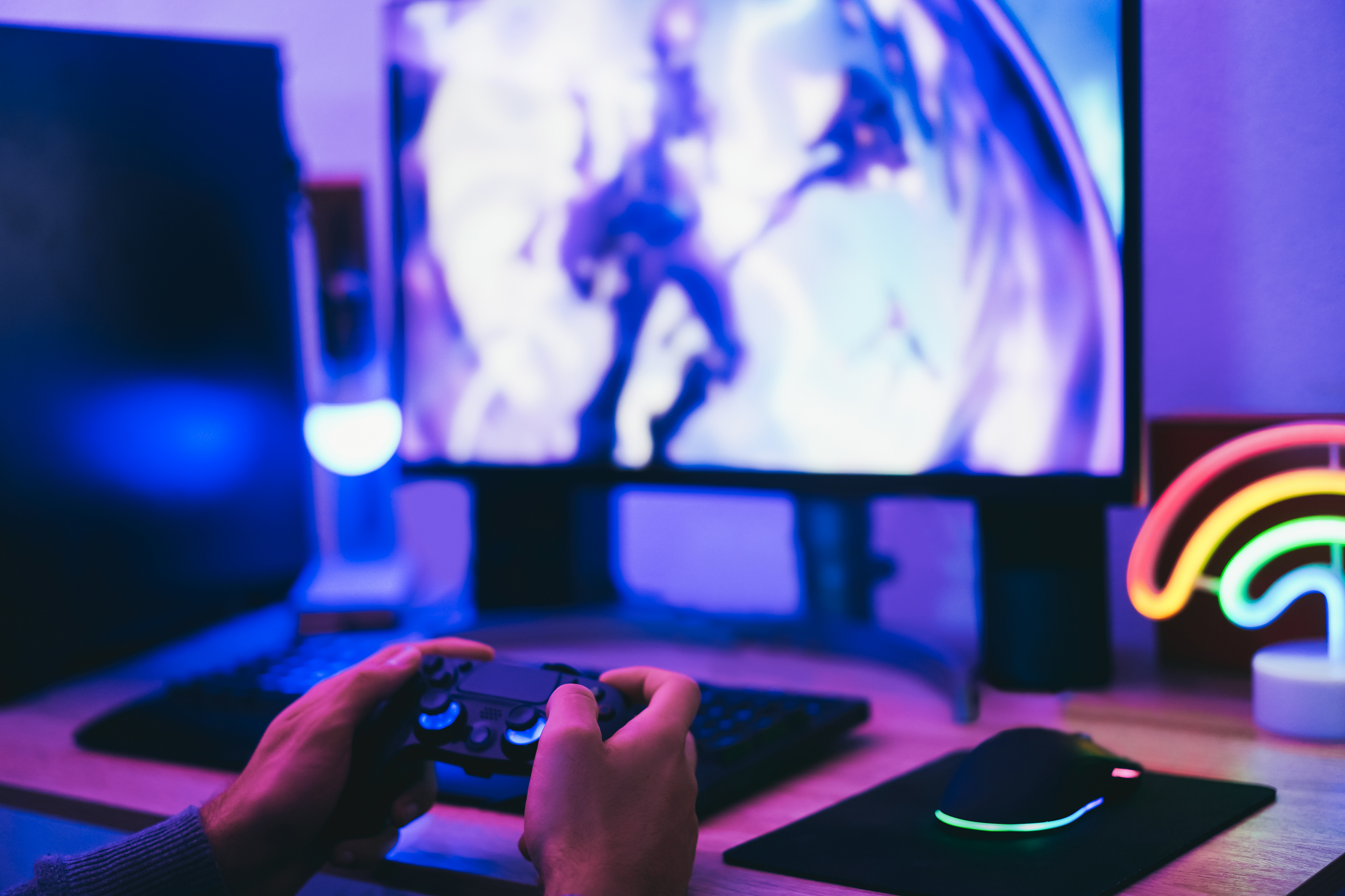 hands-play-video-game-with-colorful-neon-lighting-2026-03-19-03-00-00-utc