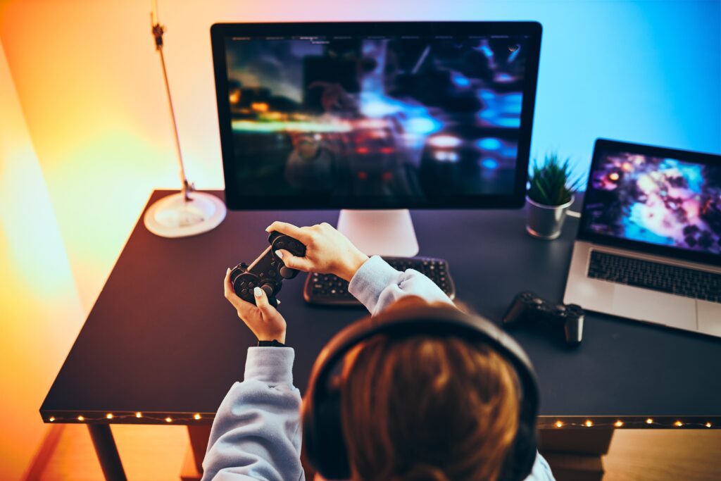 person-playing-video-game-at-computer-at-home-2026-03-20-00-52-58-utc